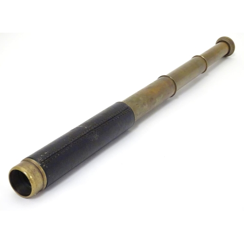 674 - Militaria: an early to mid 20thC pocket four drawer telescope, of brass construction with leather co... 