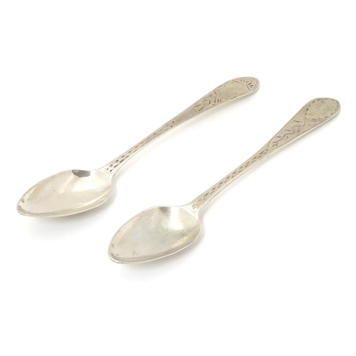 233 - Two Geo III Scottish Celtic point teaspoons with bright cut decoration  5 1/4