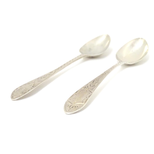 233 - Two Geo III Scottish Celtic point teaspoons with bright cut decoration  5 1/4