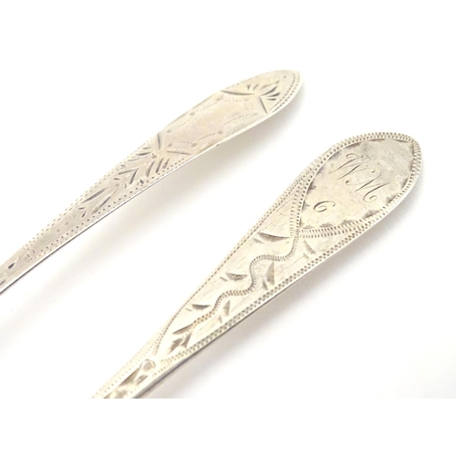 233 - Two Geo III Scottish Celtic point teaspoons with bright cut decoration  5 1/4