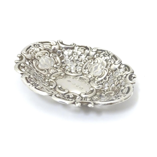 234 - A Victorian silver bon bon dish with embossed decoration. Hallmarked Birmingham 1899, Benjamin Thoma... 