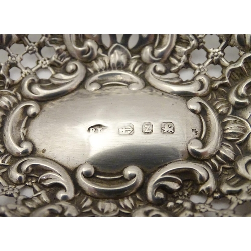 234 - A Victorian silver bon bon dish with embossed decoration. Hallmarked Birmingham 1899, Benjamin Thoma... 