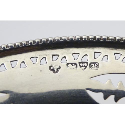 237 - A silver bonbon dish with beaded edge and pierced decoration raised on circular foot. Hallmarked Che... 