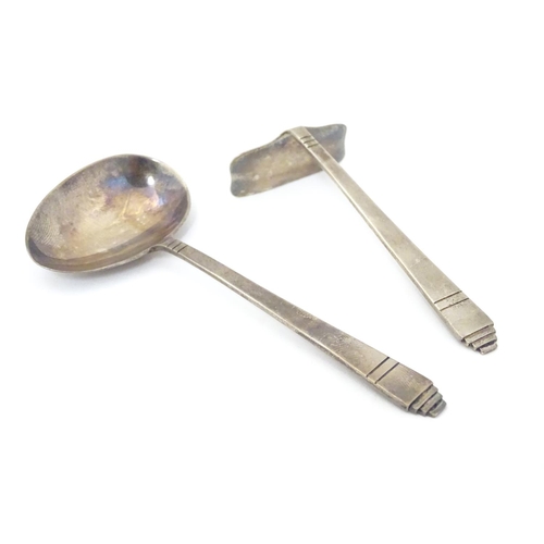 243 - An Art Deco child's silver pusher and spoon hallmarked Sheffield 1935/36 maker C W Fletcher & Son Lt... 