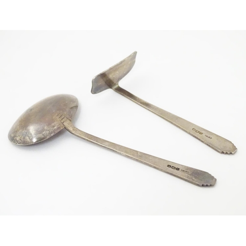 243 - An Art Deco child's silver pusher and spoon hallmarked Sheffield 1935/36 maker C W Fletcher & Son Lt... 