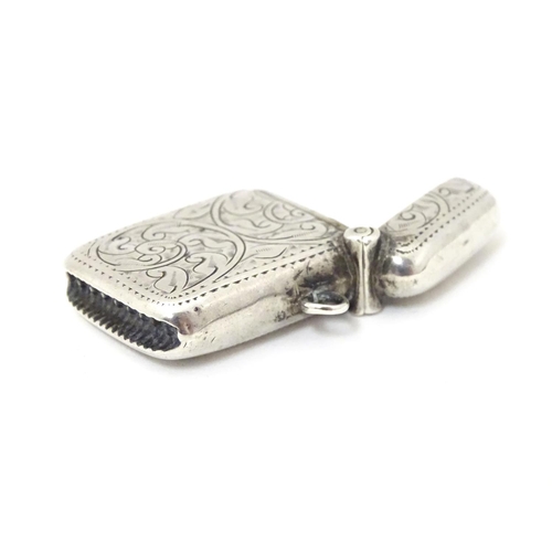 247 - A silver vesta case with engraved decoration. Hallmarked Birmingham 1913 maker Joseph Gloster Ltd.  ... 