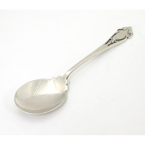 260 - A silver jam / preserve spoon with fretwork decoration to handle, hallmarked Sheffield 1933 maker Ha... 