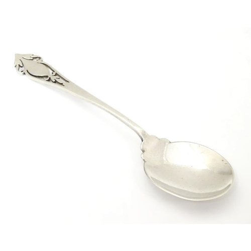 260 - A silver jam / preserve spoon with fretwork decoration to handle, hallmarked Sheffield 1933 maker Ha... 