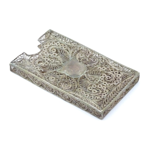 263 - A white metal card vase with filigree decoration .  3