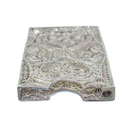 263 - A white metal card vase with filigree decoration .  3