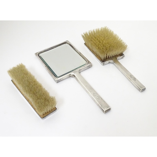 276 - Art Deco silver dressing table items with engine 
 turned decoration. Comprising two brushes and han... 