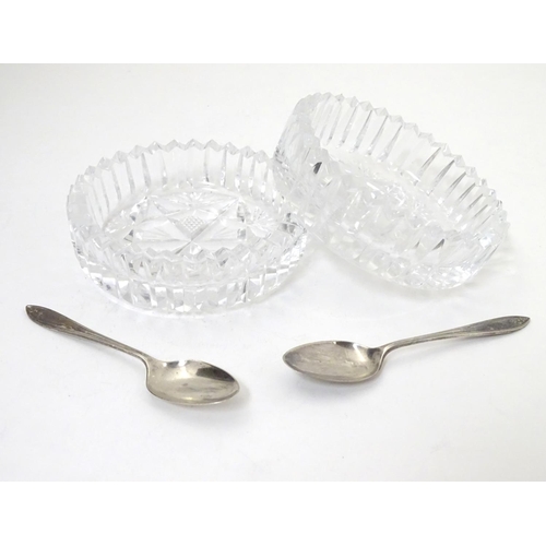 277 - A cased pair of cut glass preserve / conserve  dishes with silver spoons Hallmarked Birmingham 1934 ... 