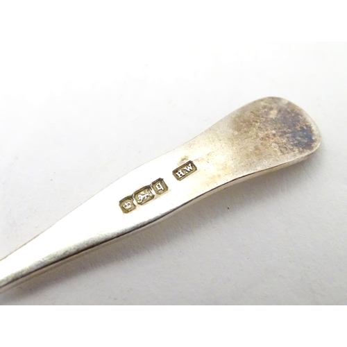 280 - A set of six silver coffee spoons with bird's claw sugar tongs en suite. Hallmarked Sheffield 1908 m... 