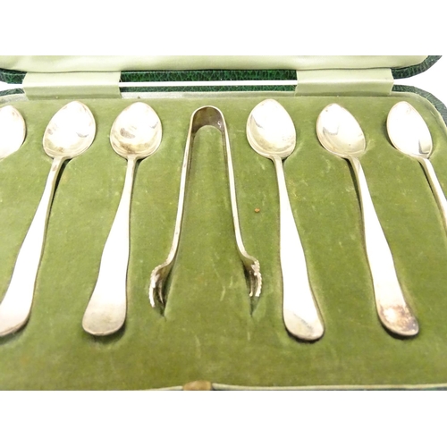 280 - A set of six silver coffee spoons with bird's claw sugar tongs en suite. Hallmarked Sheffield 1908 m... 