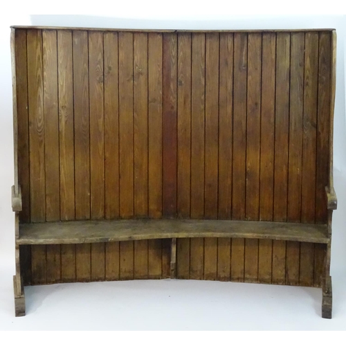 1562 - A 19thC tavern settle with an elm seat, planked bow back and shaped sides with scrolled armrests. 93... 