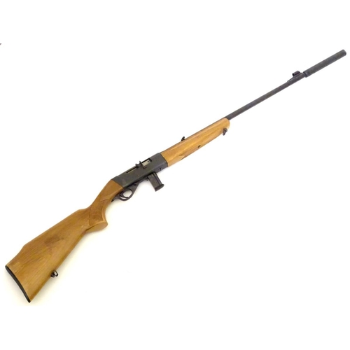 2048 - Rimfire rifle: an Anschutz 'Modell 525' .22LR semi-automatic rifle, 30 1/4'' barrel (including Parke... 