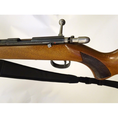 2050 - Rimfire rifle: an Anschutz 'Modell 1450' .22LR bolt-action rifle, 26'' barrel (including sound moder... 