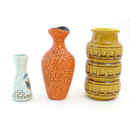 115 - Three West German vases, comprising a Jasba Keramik vase with an orange crackle glaze, a mustard yel... 