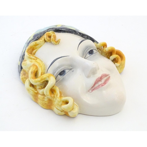 137 - WITHDRAWN FROM AUCTION - Apologies for any inconvenience. An Art Deco Goebel wall mask depicting the... 