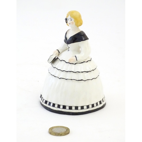 143 - A Royal Worcester crinoline lady. Marked under no. 2621. Approx. 4 3/4