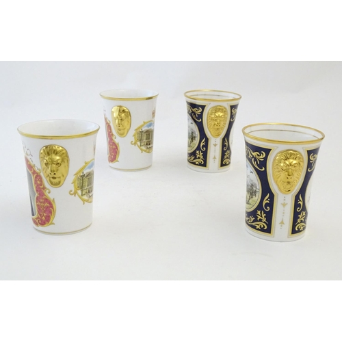 151 - Four commemorative beakers produced for Peter Jones China, comprising two limited edition Caverswall... 