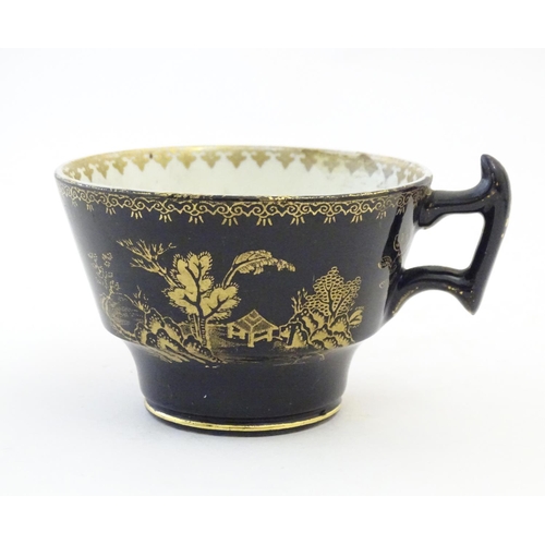 177 - A Booths Silicon China tea cup and saucer, together with two small plates with a black ground and gi... 