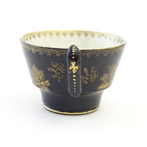 177 - A Booths Silicon China tea cup and saucer, together with two small plates with a black ground and gi... 