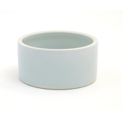 54 - A Chinese brush wash pot of circular form with a pale blue ground. Approx. 1 3/4