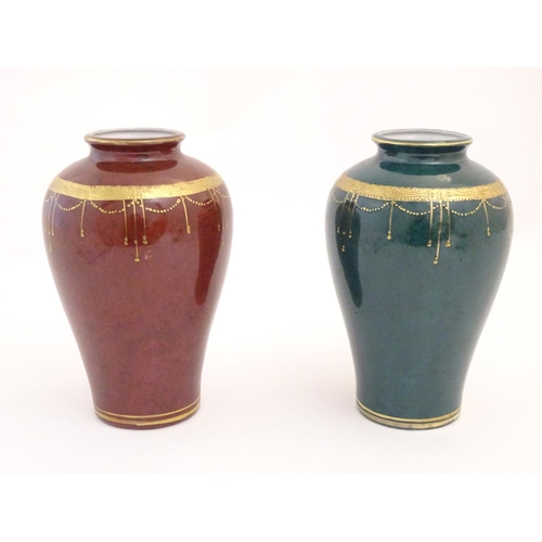 67 - A matched pair of Oriental vases with gilt banded detail. Character marks under. Approx. 9 1/2