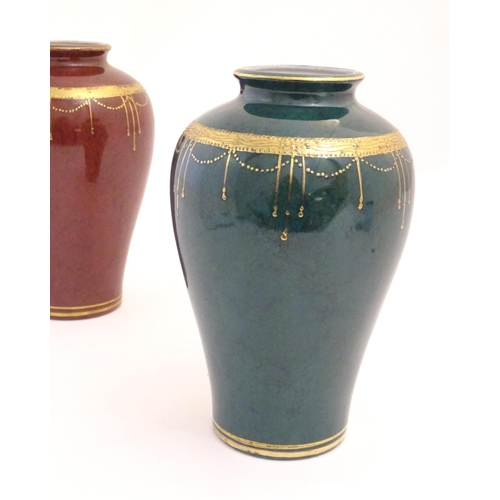 67 - A matched pair of Oriental vases with gilt banded detail. Character marks under. Approx. 9 1/2