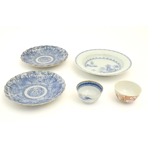 70 - Five assorted Oriental items, comprising two Japanese blue and white plates with scalloped edges, de... 