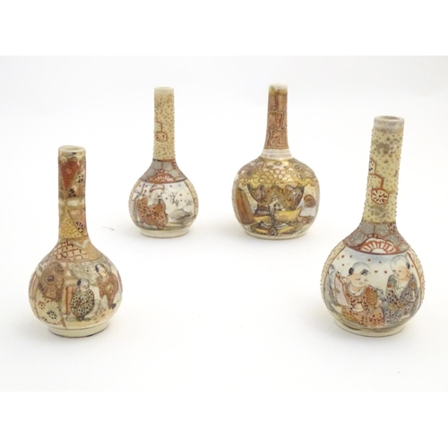 71 - A quantity of Japanese Satsuma vases of various shapes and sizes, decorated with figures, landscapes... 