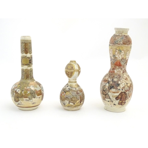 71 - A quantity of Japanese Satsuma vases of various shapes and sizes, decorated with figures, landscapes... 