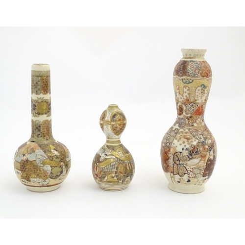 71 - A quantity of Japanese Satsuma vases of various shapes and sizes, decorated with figures, landscapes... 