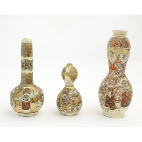 71 - A quantity of Japanese Satsuma vases of various shapes and sizes, decorated with figures, landscapes... 