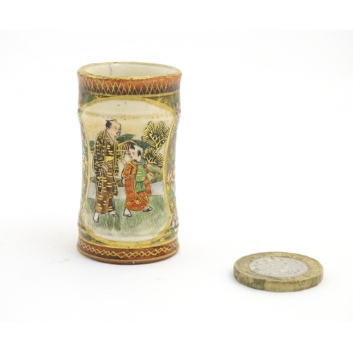 71 - A quantity of Japanese Satsuma vases of various shapes and sizes, decorated with figures, landscapes... 