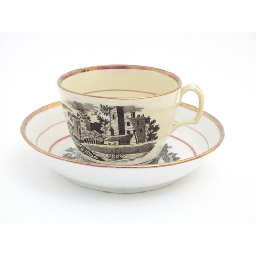 90 - A 19thC tea cup and saucer with monochrome transfer decoration depicting a river landscape with a sh... 