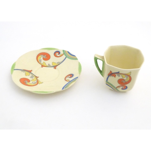 91 - A Royal Doulton Art Deco coffee set in the pattern Syren with scrolling foliate detail, comprising a... 