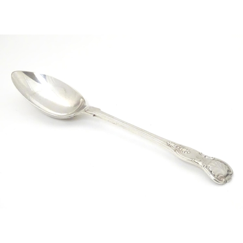 282 - A silver kings pattern tablespoon, hallmarked Birmingham 1908 maker Elkington & Co . 8 1/2