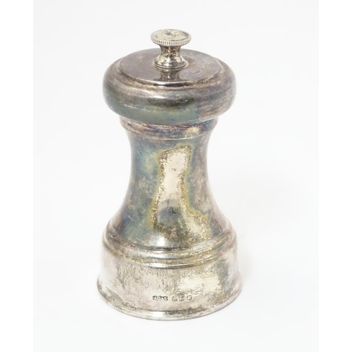 284 - A silver pepper mill / grinder, hallmarked Sheffield 1964 maker James Dixon & Sons.  3 1/2