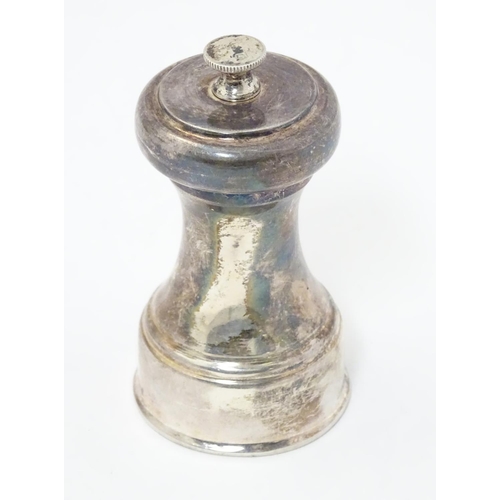 284 - A silver pepper mill / grinder, hallmarked Sheffield 1964 maker James Dixon & Sons.  3 1/2