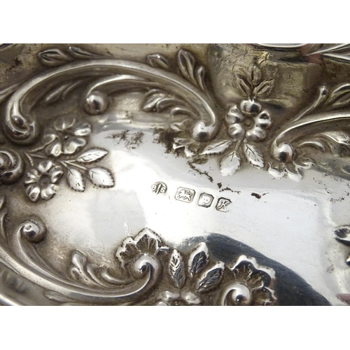 285 - A silver dish with embossed decoration, hallmarked London 1984 maker BJS. 5 1/2