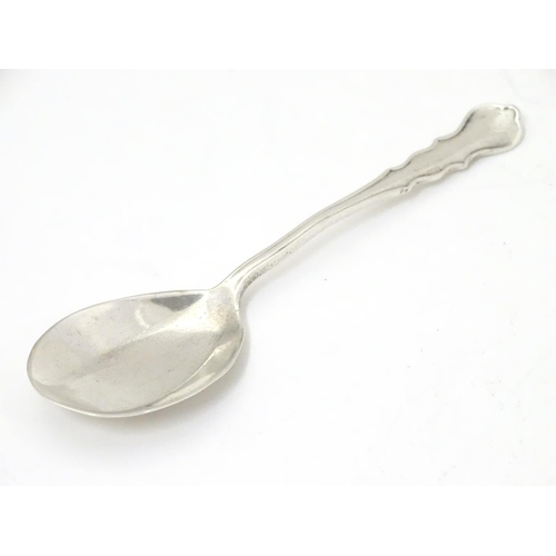 286 - A silver jam / preserve spoon, hallmarked London 1921.  4 3/4