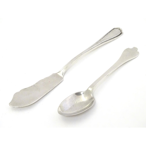 305 - A  silver butter knife, hallmarked London 1922 maker ,Josiah Williams & Co together with a teaspoon ... 