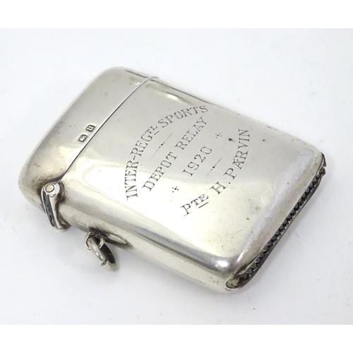 310 - A silver vesta case, hallmarked Birmingham 1919 and engraved Inter-Regimental Sports Depot Relay 192... 