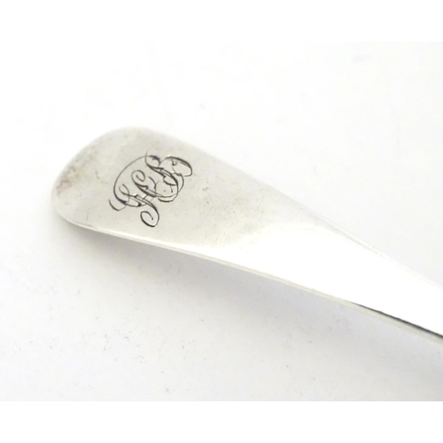 317 - A Geo III silver old English pattern salt spoon, hallmarked London 1801 maker GW 4 1/2