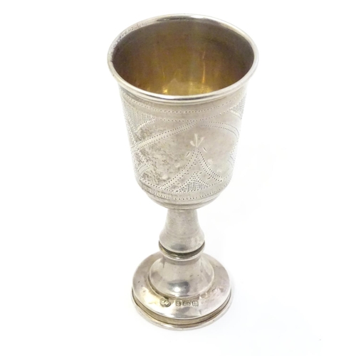 318 - A silver Kiddush cup with engraved decoration. Hallmarked Birmingham 1911 maker Jacob Fenigstein. Ap... 