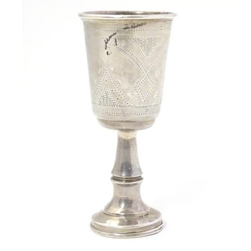 318 - A silver Kiddush cup with engraved decoration. Hallmarked Birmingham 1911 maker Jacob Fenigstein. Ap... 