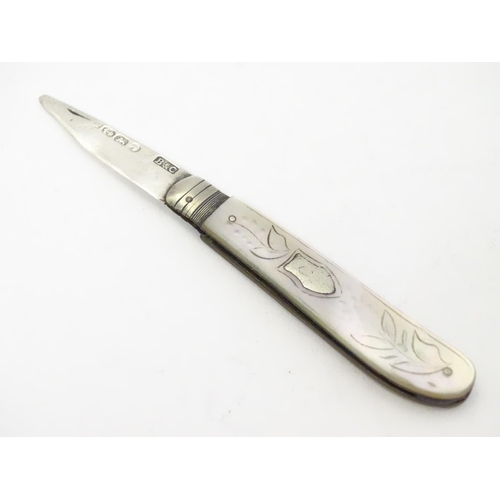 322 - A silver fruit knife with mother of pearl handle. Hallmarked Sheffield 1859 maker Brown & Clark . 2 ... 