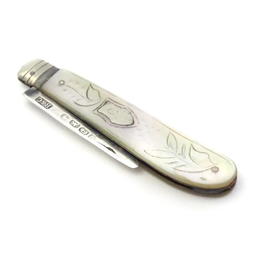 322 - A silver fruit knife with mother of pearl handle. Hallmarked Sheffield 1859 maker Brown & Clark . 2 ... 